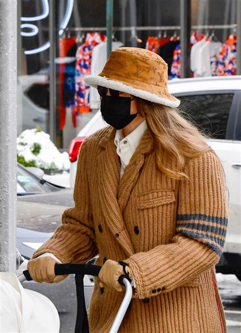 Gigi Hadid’s Louis Vuitton Bucket Hat Is Peak Mom.